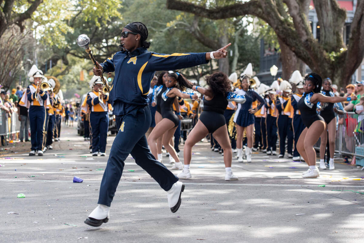Heidelberg High School Marching Band marches during the Ocean Springs Elks Club Mardi Gras Parade in Ocean Springs on Saturday, Feb. 15, 2025.
