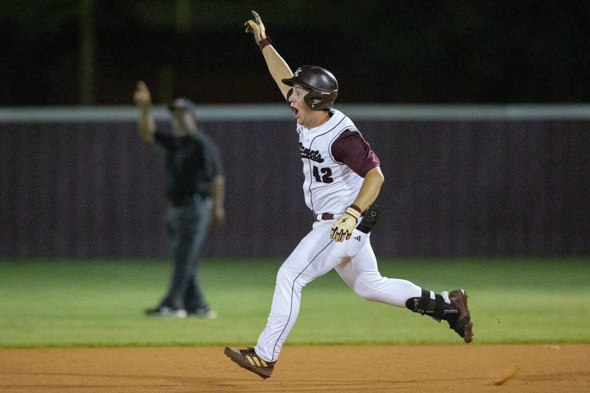 East Central’s Nate Trochessett celebrates as he runs the bases after scoring a home run in the 5A South State championship game at East Central High School in Hurley on Tuesday, May 23, 2023.