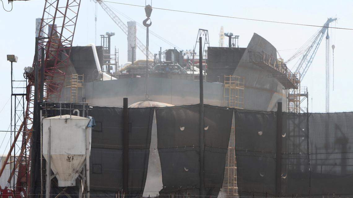 JOHN FITZHUGH/SUN HERALD /2015 
 The current blast and paint facility at VT Halter Marine in Pascagoula, shown on Monday Aug. 3, 2015, is a series of curtains drawn loosely around ship sections being worked on. VT Halter has yet to break ground on a permanent facility.