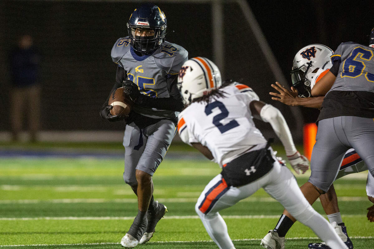 Gautier’s Paul Irving carries the ball down the field during a playoff game against Wayne County at Gautier High School in Gautier on Friday, Nov. 11, 2022.