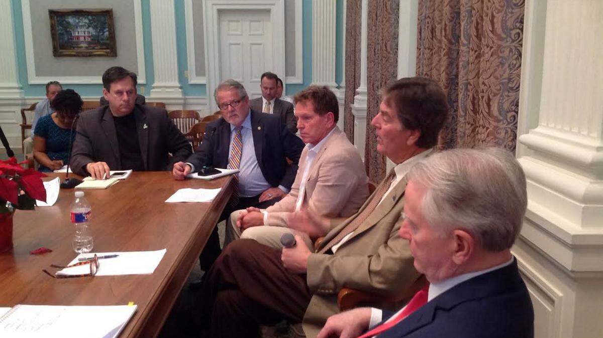 Seated around a table during a workshop in Biloxi Tuesday are, from left, Councilman Kenny Glavan, lobbyist R. Scott Levanway, F. Cliff Kirkland, Mayor Andrew “FoFo” Gilich and city attorney Gerald Blessey. At the Tuesday afternoon meeting, the administration will ask the council to hire Levanway to lobby for money for higher speed Internet for the Coast and other projects. Gulfport is expected to vote on whether to share the other half of Levanway’s $5,000 a month fee.