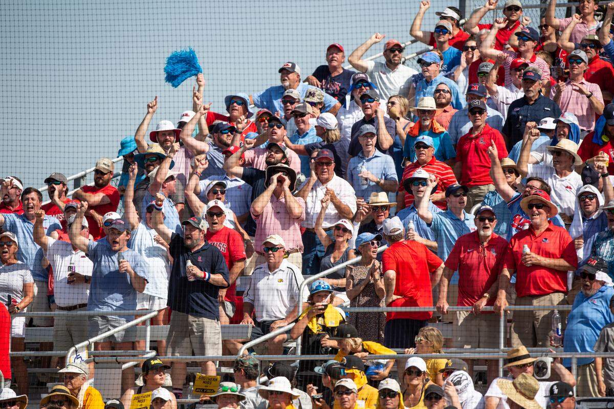 Ole Miss fans cheer for their team during the Super Regionals Final at Pete Taylor Park in Hattiesburg on Sunday, June 12, 2022.