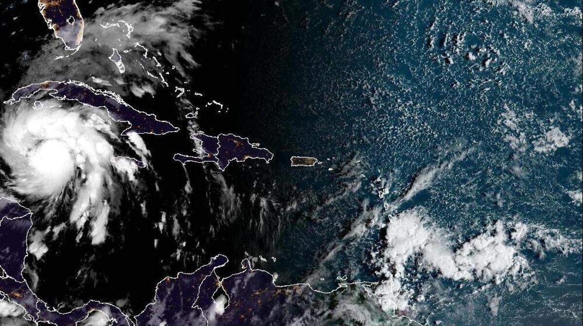 The satellite photo of Hurricane Ian shows its position in the Caribbean. It is expected to turn north Monday and head toward Florida as a major hurricane.