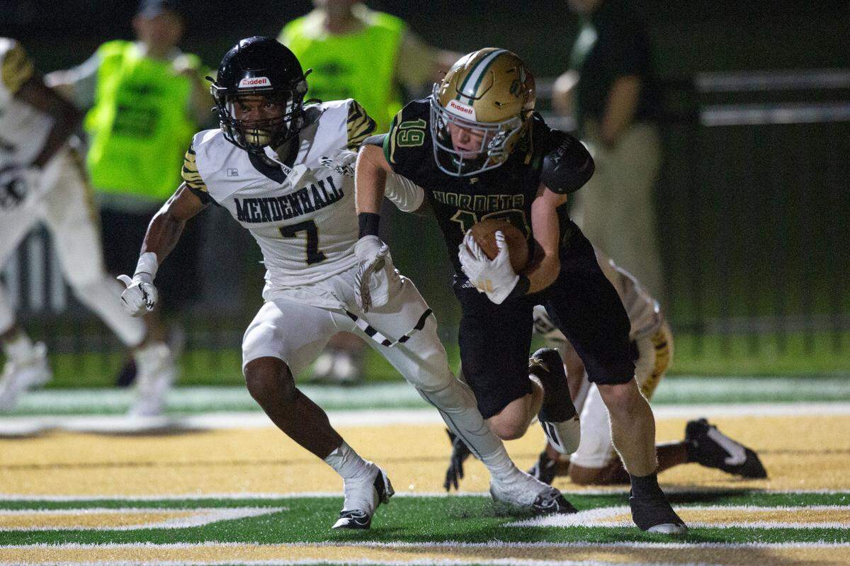 Poplarville’s Eli Seal intercepts a pass in the end zone during a playoff game between Poplarville and Mendenhall at Poplarville on Friday, Nov. 8, 2024.
