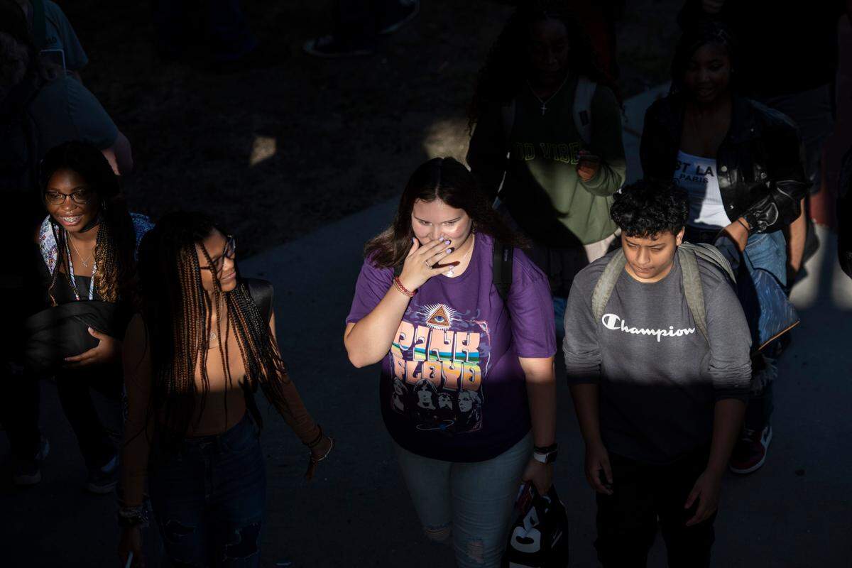 High school students walk to their first class on the first day of school at Ocean Springs High School in Ocean Springs on Friday, Aug. 5, 2022.