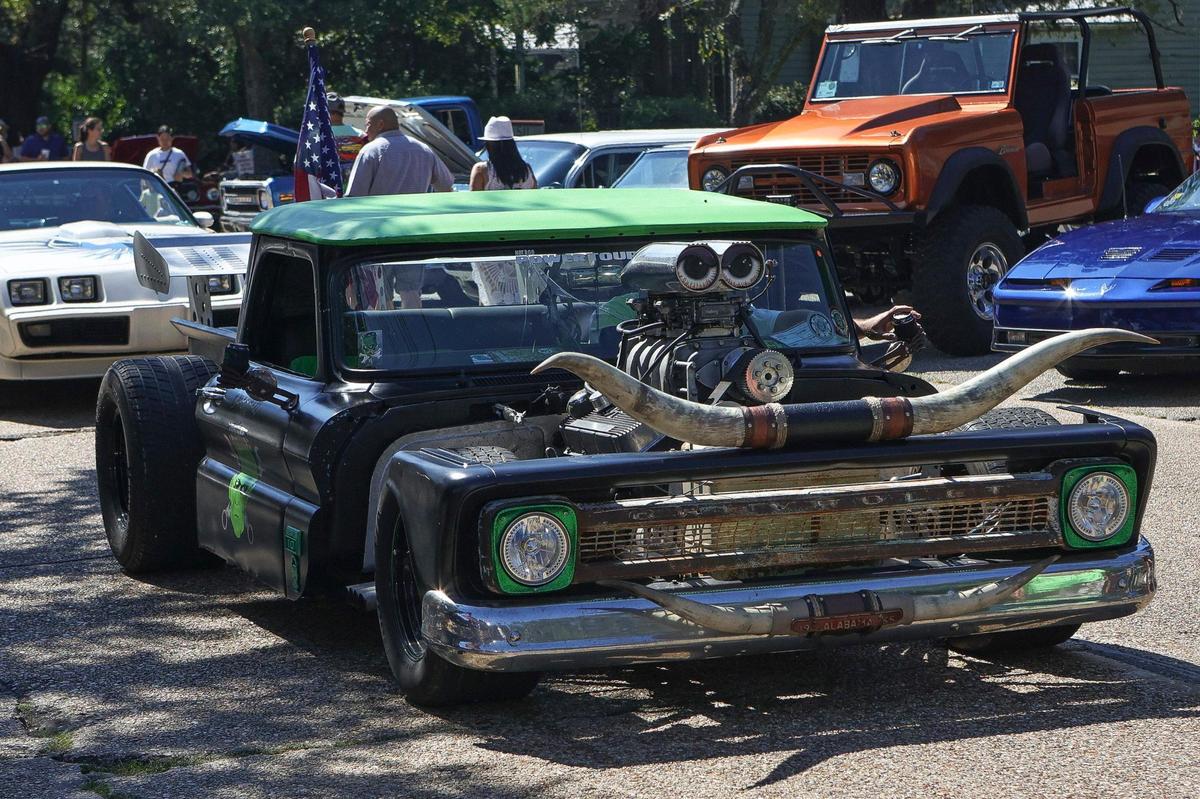 A unique chopped Chevy pickup with a longhorn hood ornament during the Ocean Springs Cruisin’ the Coast Block Party, October 8, 2021.