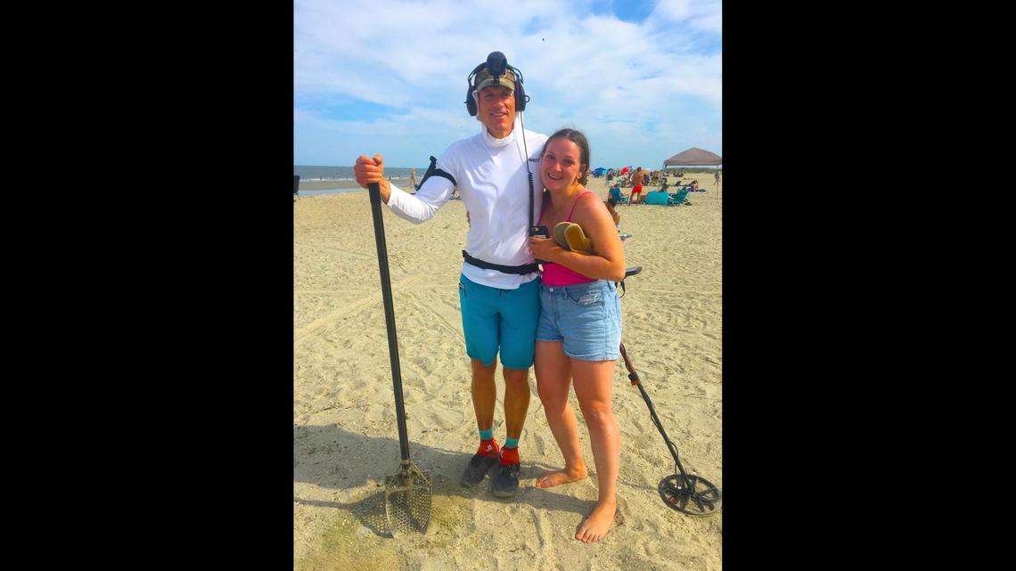 Local treasure hunter Brian Harper (left) and his metal detector are credited with locating a woman’s lost engagement ring on a beach in Tybee Island, Georgia.