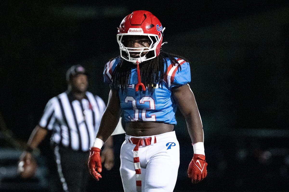 Pascagoula linebacker Creevy Harness (32) between plays during a football game at Pascagoula High School on Thursday, Nov. 6, 2025.