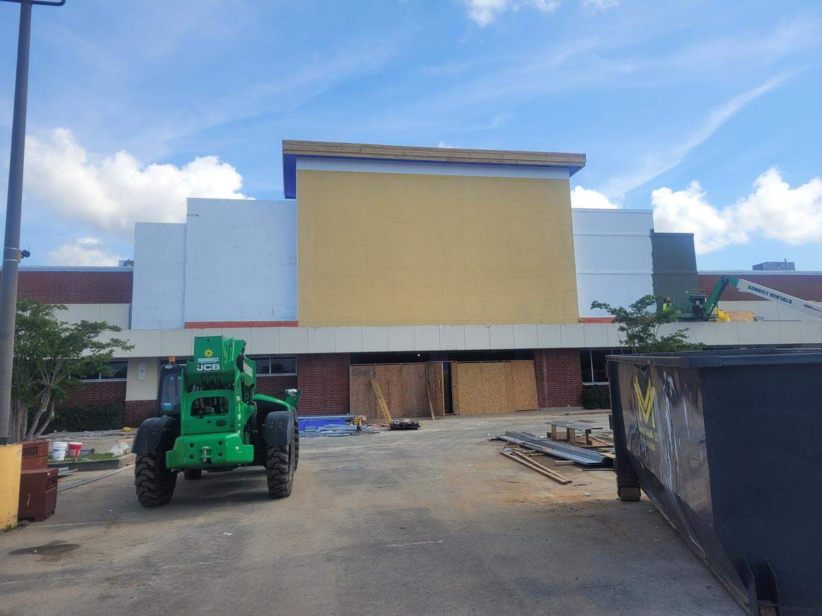 The exterior of the new grocery store on Pass Road in Biloxi is getting a Rouses Markets look. The store is expected to open this summer.