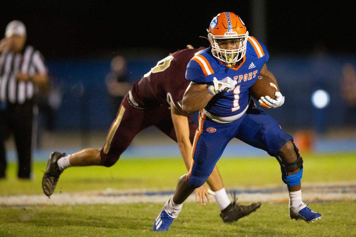 Gulfport’s Emmanuel Bentley evades George County’s defense during a game against George County at Milner Stadium in Gulfport on Saturday, Aug. 27, 2022.