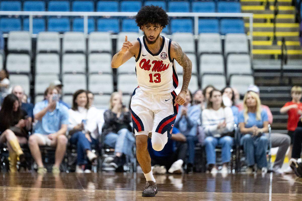 Mississippi guard Kezza Giffa (13) celebrates after scoring Saturday.