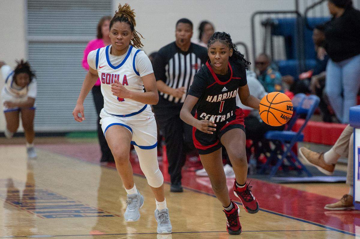 Harrison Central’s Michelle Jackson dribbles the ball during a game against Pascagoula at Pascagoula High School on Tuesday, Dec. 5, 2023.