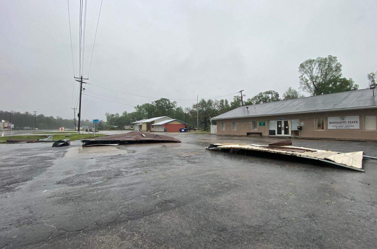 Debris from portable buildings at Gulf Coast Portable Buildings are strewn about near the Mississippi State Extension Service Office in Kiln after a possible tornado hit the area on Wednesday, April 10, 2024.
