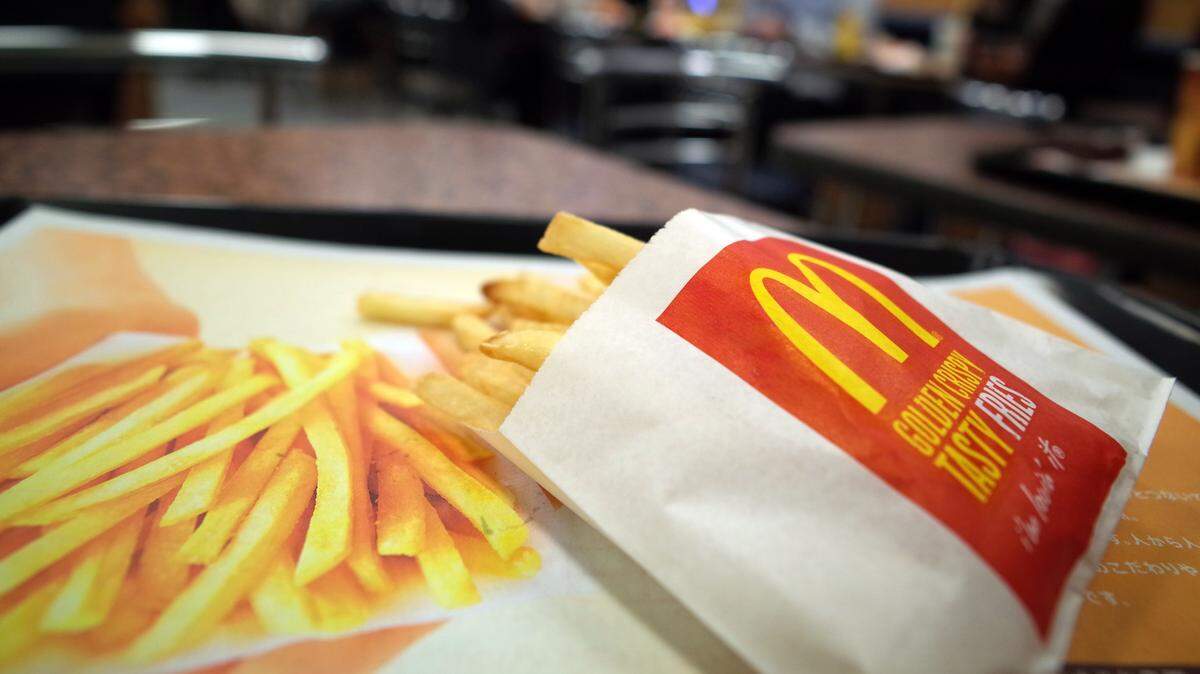 A small fries is seen at a McDonald's restaurant in Tokyo, Wednesday, Dec. 17, 2014. Beginning July 2, 2018, you can receive a free medium order of fries on Fridays for the rest of 2018, as long as you make a minimum $1 purchase through the app.