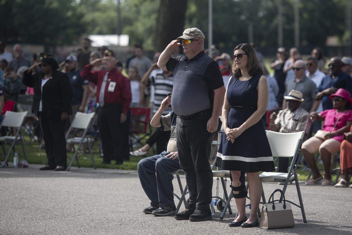 Veterans salute the flag during a Memorial Day ceremony at Biloxi National Cemetery in Biloxi on Monday, May 26, 2025.