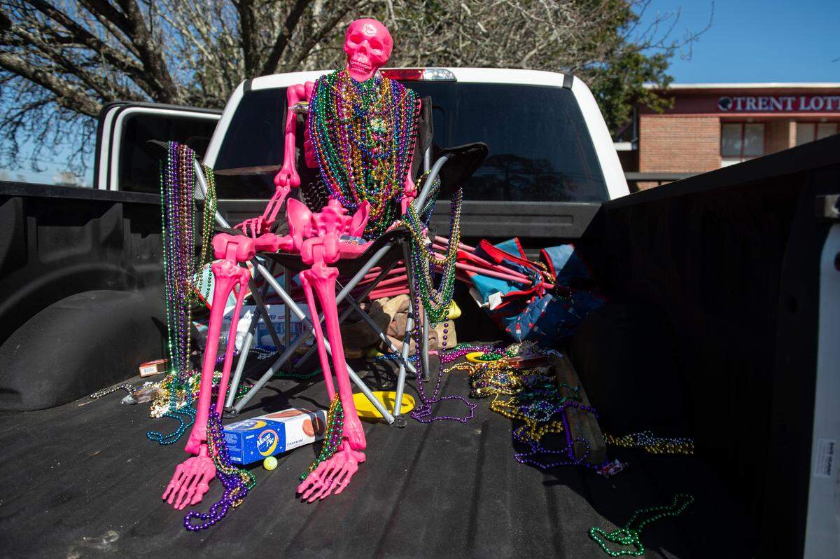 A skeleton wears beads during the Jackson County Carnival Association Mardi Gras parade in Pascagoula on Saturday, March 1, 2025.
