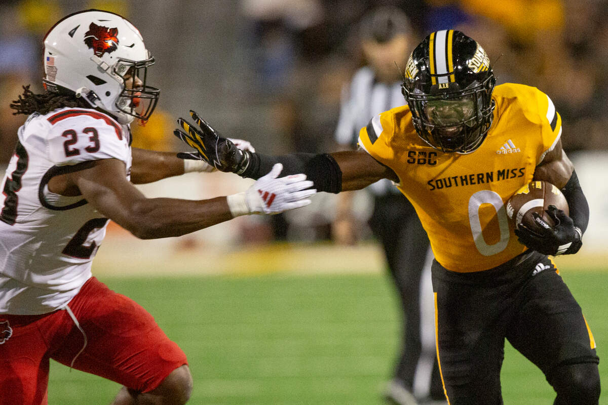 Southern Miss Golden Eagles running back Rodrigues Clark (0) runs the ball during a game between Southern Miss and Arkansas State at M.M. Roberts Stadium in Hattiesburg on Saturday, Oct. 19, 2024.