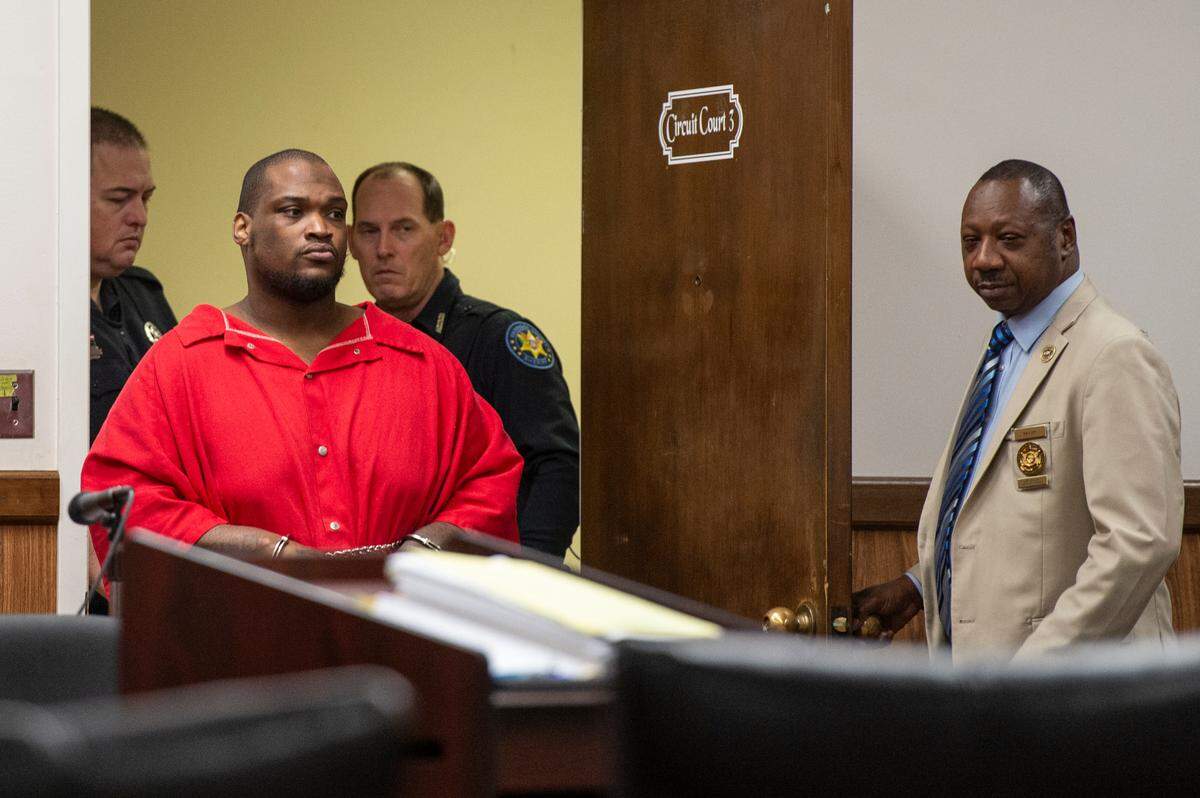 Andrew Malik Jones, who is accused of raping a woman at an outlet mall, arrives at the Harrison County Courthouse in Gulfport on Wednesday, Jan. 17, 2024, to plead guilty to three charges.