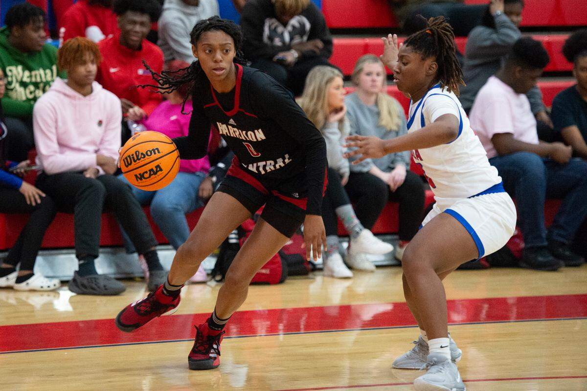 Harrison Central’s Anaisha Carriere dribbles the ball during a game against Pascagoula at Pascagoula High School on Tuesday, Dec. 5, 2023.