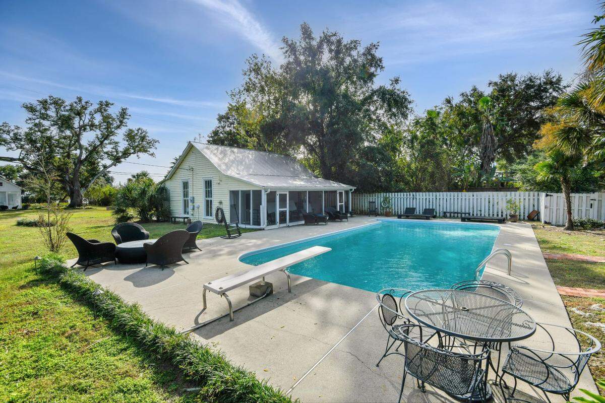 On this home’s 1.4 acres there is a private pool and pool house, which has been redone from its original use as a turn of the century stable.