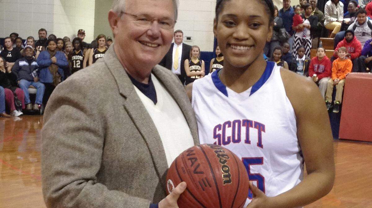Rick Cleveland with Victoria Vivians when she was at Scott Central.