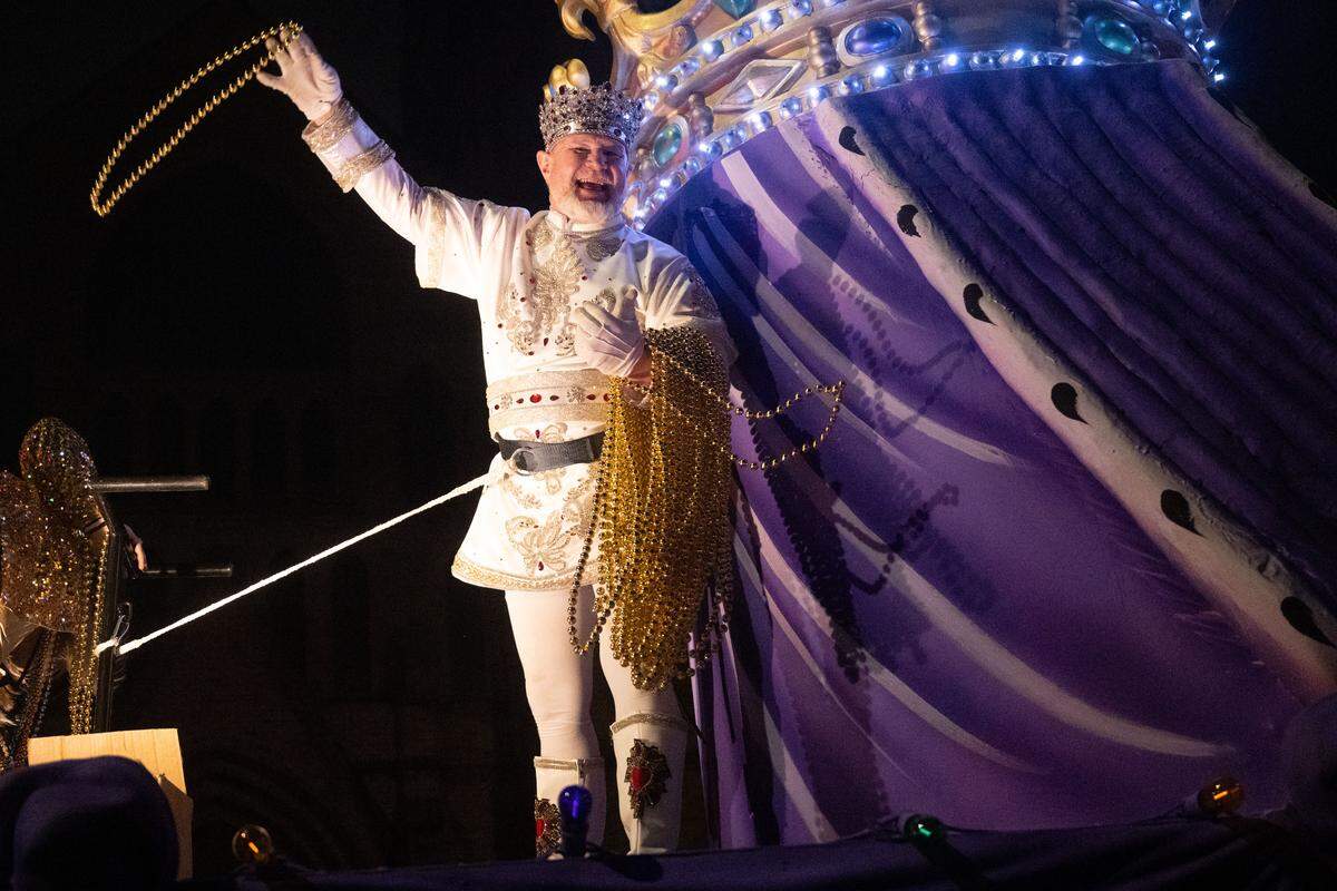 Mardi Gras beads were flying during the Krewe of Neptune parade in Biloxi on Saturday, Feb. 14, 2026.