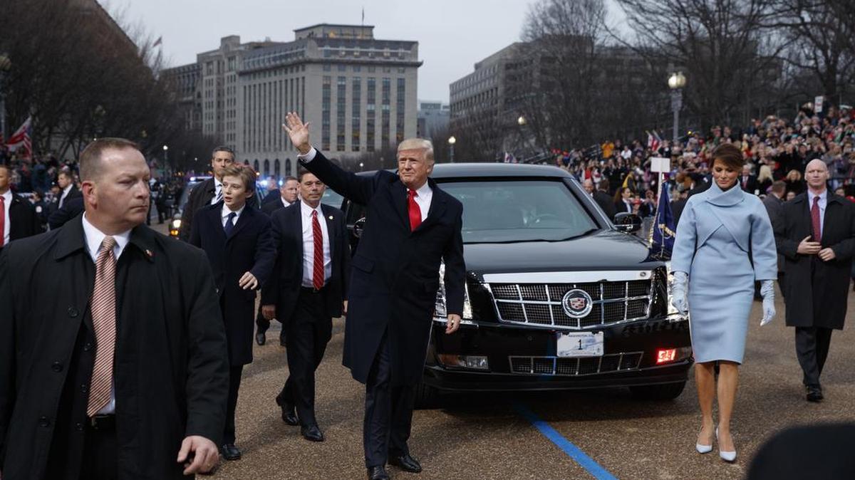 President Donald Trump and first lady Melania Trump walk near the White House in the inaugural parade after he was sworn in as the 45th President of the United States, Friday, Jan. 20, 2017, in Washington.