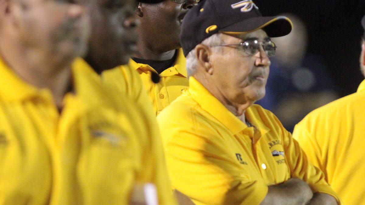 JOHN FITZHUGH/SUN HERALD 
 D'Iberville coach Buddy Singleton watches his team play against Picayune during the second quarter of their game at Warrior Stadium in D'Iberville on Friday Sept. 5, 2014.