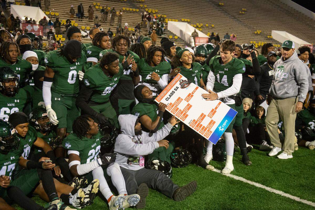 West Point celebrates after winning the MSHAA Class 5A Football Championship at M.M. Roberts Stadium in Hattiesburg on Friday, Dec. 6, 2024.