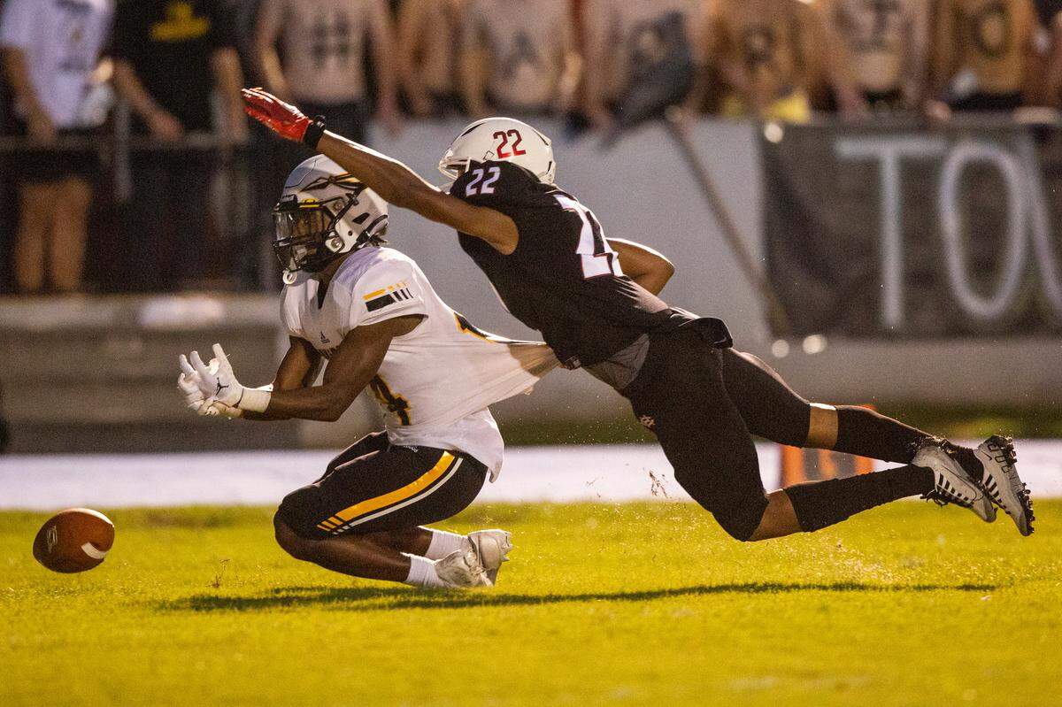Harrison Central’s Darrion Kirksey blocks a pass to Oak Grove’s Damari Jefferson during a game against Oak Grove at Milner Stadium in Gulfport on Friday, Aug. 26, 2022.