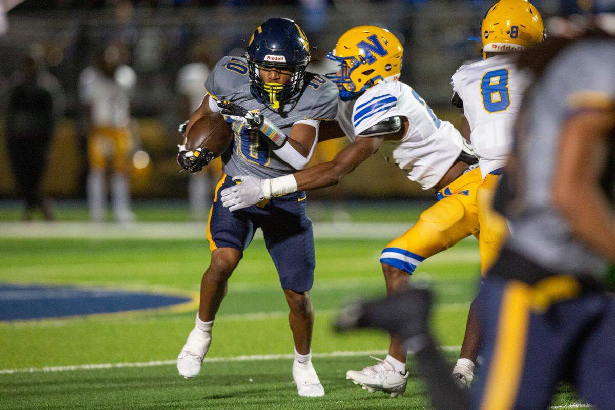 Gautier wide receiver Devon Garrett runs the ball during a 5A playoff game between Gautier and Natchez at Gautier High School on Friday, Nov. 15, 2024.