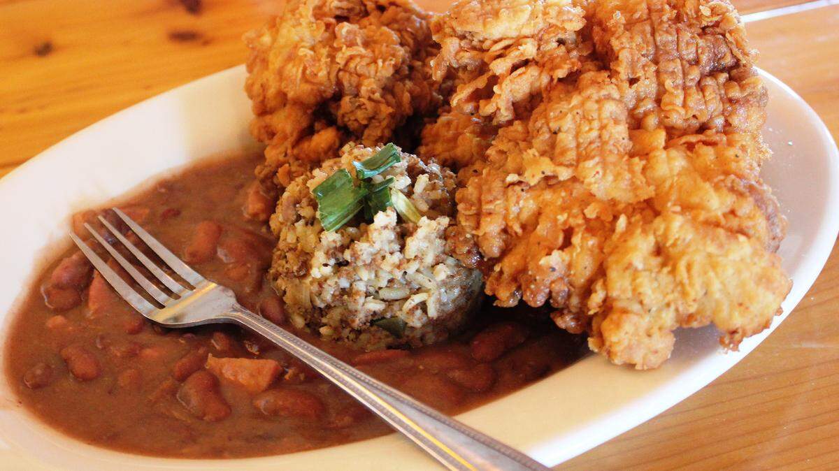 JULIAN BRUNT/SPECIAL TO THE SUN HERALDCrispy and moist fried chicken served at Pelican Wharf.