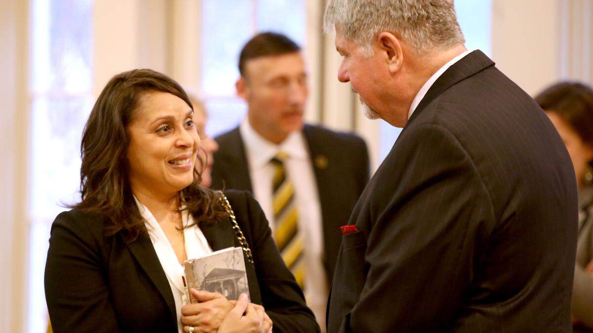 AMANDA McCOY/SUN HERALDPulitzer Prize winner Natasha Trethewey, left, talks to fellow panelist Stan Tiner, former editor of the Sun Herald, before the start of a program commemorating the 100th anniversary of the Pulitzer on Thursday at the University of Southern Mississippi Gulf Park campus in Long Beach. Several Pulitzer winners from the state were present for the panel.