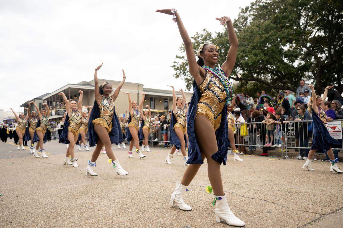 Majorettes from Mississippi Gulf Coast Community College perform on Lameuse Street.