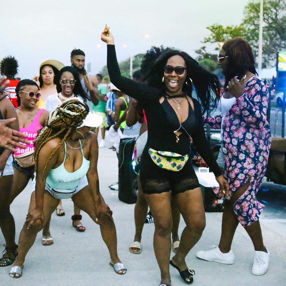 Women dance on the beach during black spring break in Biloxi. This year's event April 7-10 will be on the Biloxi beach and at nightclub venues on the Coast.