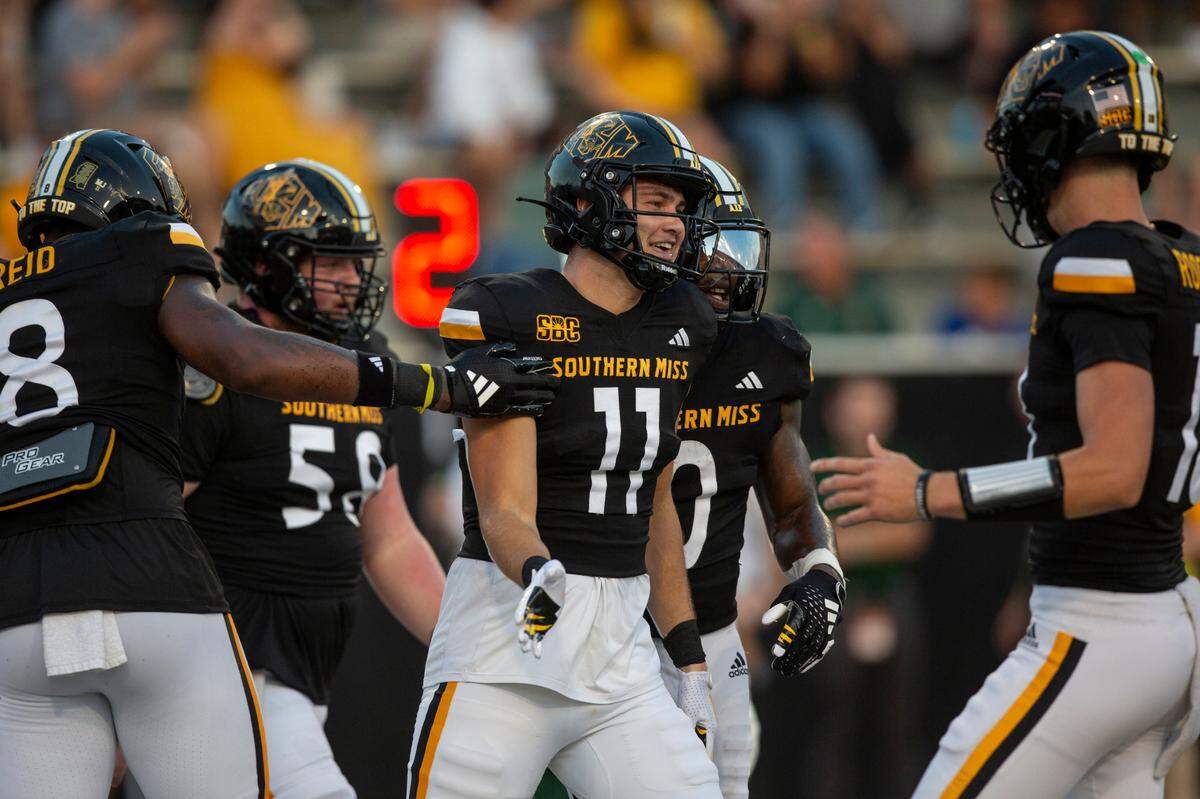 Southern Miss Golden Eagles wide receiver Davis Dalton (11) celebrates with his teammates after scoring during a game between Southern Miss and Southeastern Louisiana at M.M. Roberts Stadium in Hattiesburg on Saturday, Sept. 7, 2024.