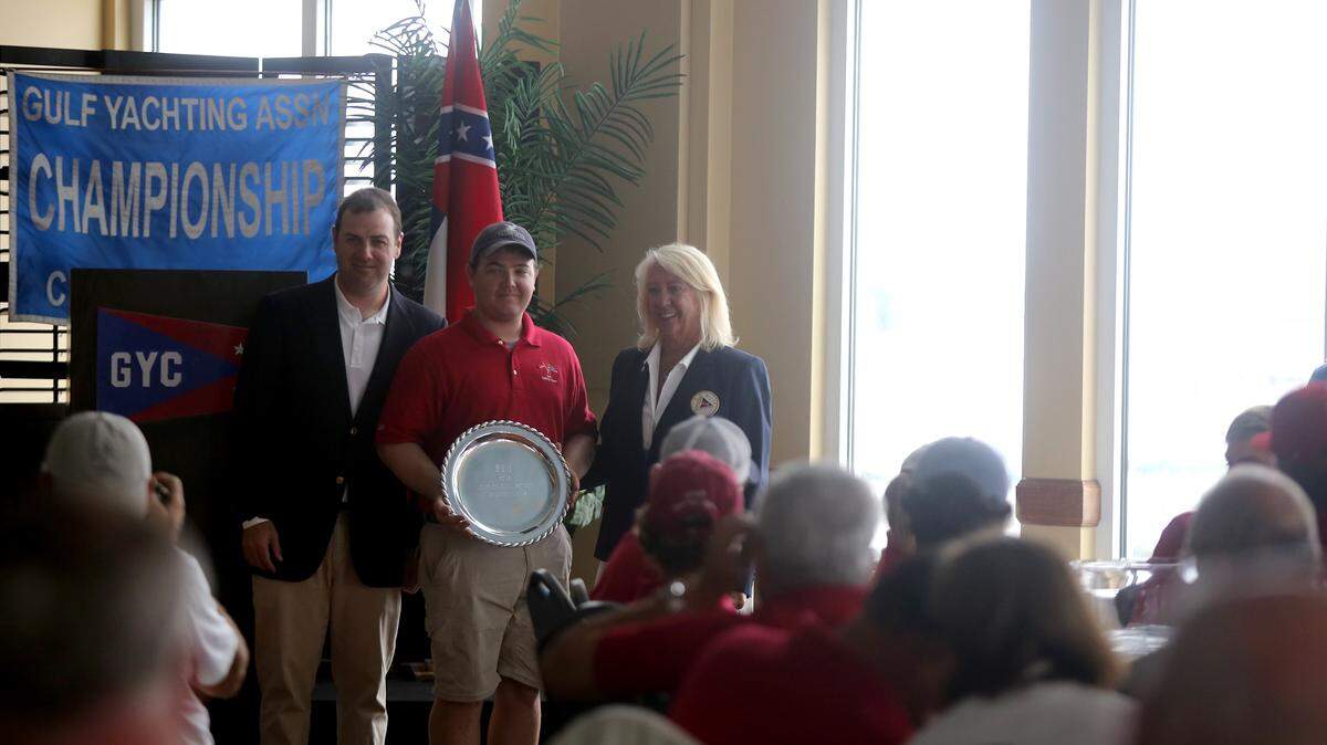 AMANDA McCOY/SUN HERALD 
 The Southern Yacht Club is presented the trophy as overall winner of the 2016 Gulf Yachting Association Offshore Challenge Cup on Sunday, June 19, 2016, at the Gulfport Yacht Club. SYC captain Patrick Ryan accepts the trophy.