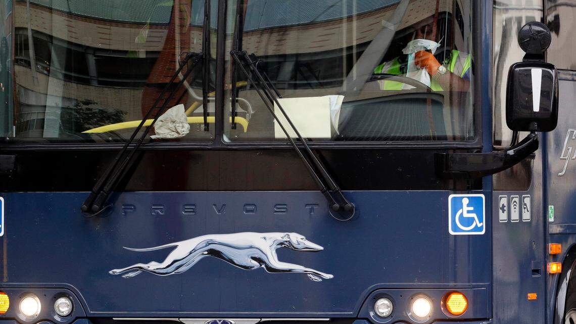 FILE - An armed person on board a Greyhound bus on 1-85 in Norcross, Georgia, has been taken into custody after a SWAT standoff, Gwinnett County police said. The above is a file photo and doesn’t depict the bus involved. (AP Photo/Eric Gay, File)