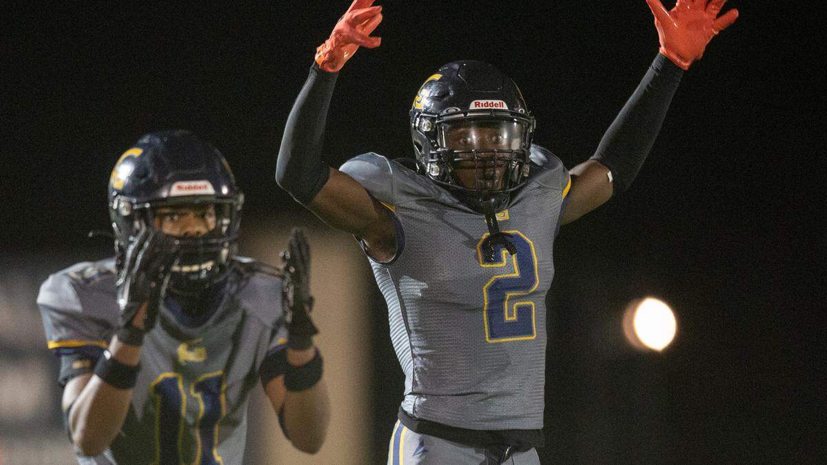 Gautier’s Dillon Richburg and Shamarie Carroll react to a play call during a playoff game against Wayne County at Gautier High School in Gautier on Friday, Nov. 11, 2022.