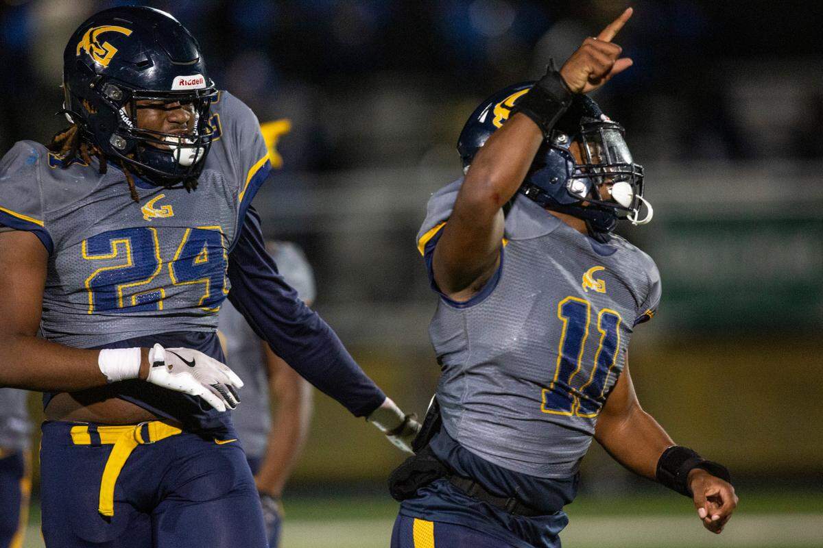 Gautier defensive lineman Brayden Jackson and Fred Nicholson react after a play during a 5A playoff game between Gautier and Natchez at Gautier High School on Friday, Nov. 15, 2024.