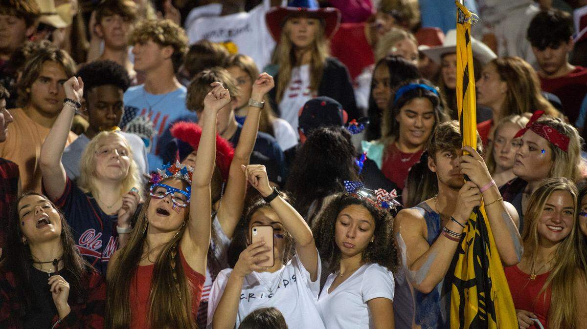 The D’Iberville student section cheers during the D’Iberville versus Picayune game at D’Iberville Stadium on Friday, Sept. 17, 2021.