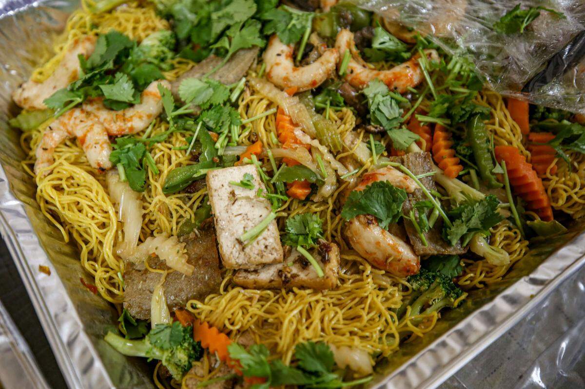 Vegetarian dishes were prepared and given to members of the church in styrofoam boxes after the service.