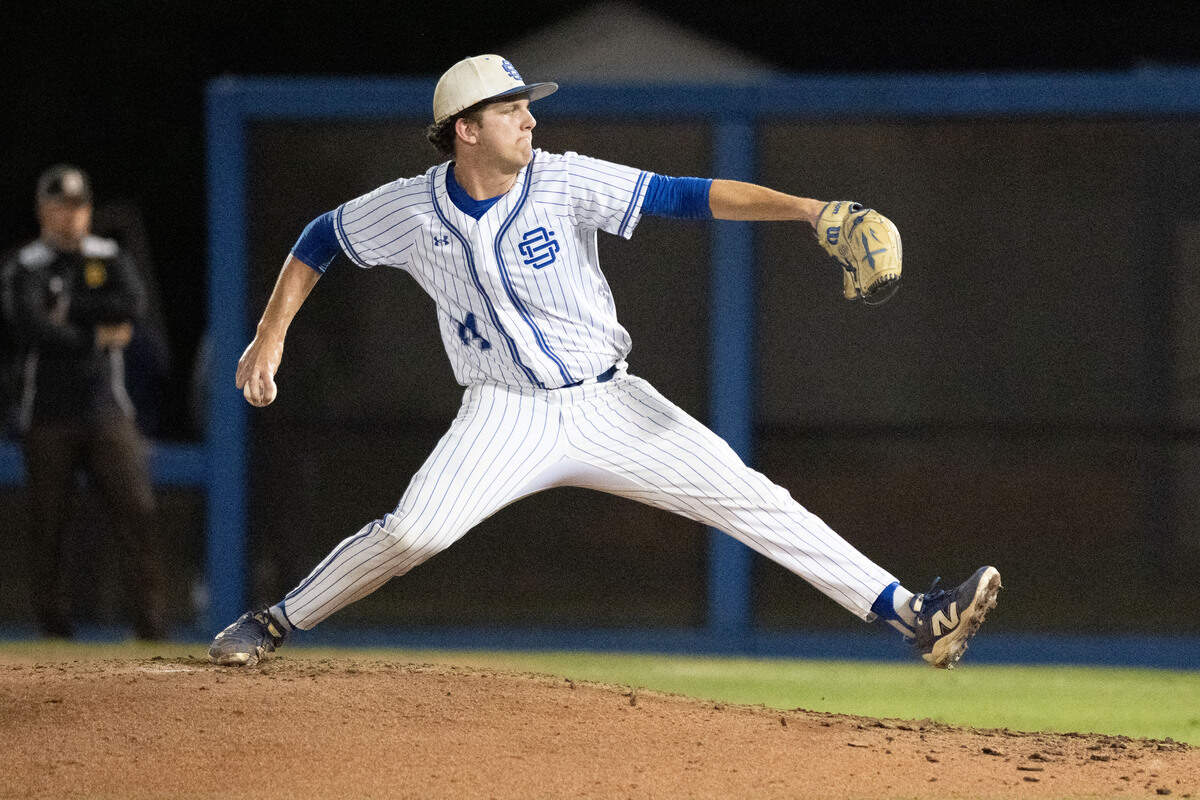 Ocean Springs pitcher Adam Clower delivers a pitch against D’Iberville.