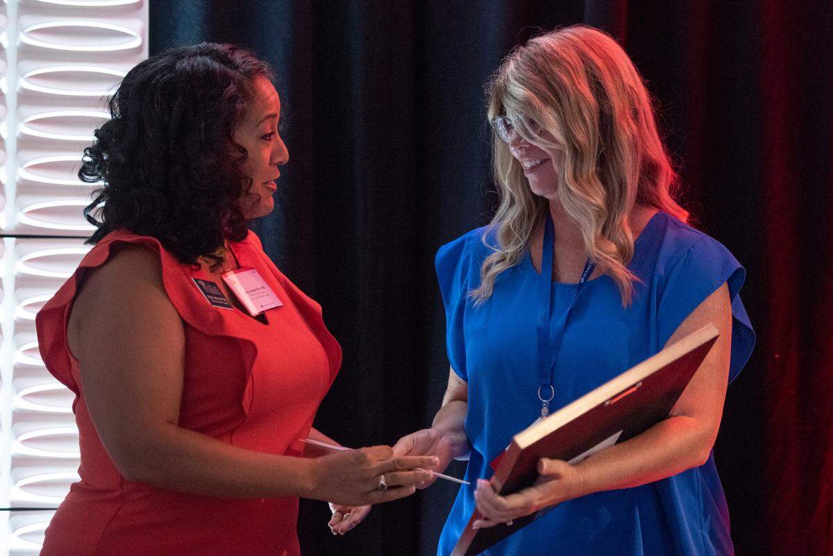 Karen Jean Boutwell, right, of Pearl River Middle School, accepts a Leo W. Seal grant during the Leo W. Seal awards luncheon at the Great Southern Club in Gulfport on Friday, Aug. 26, 2022.