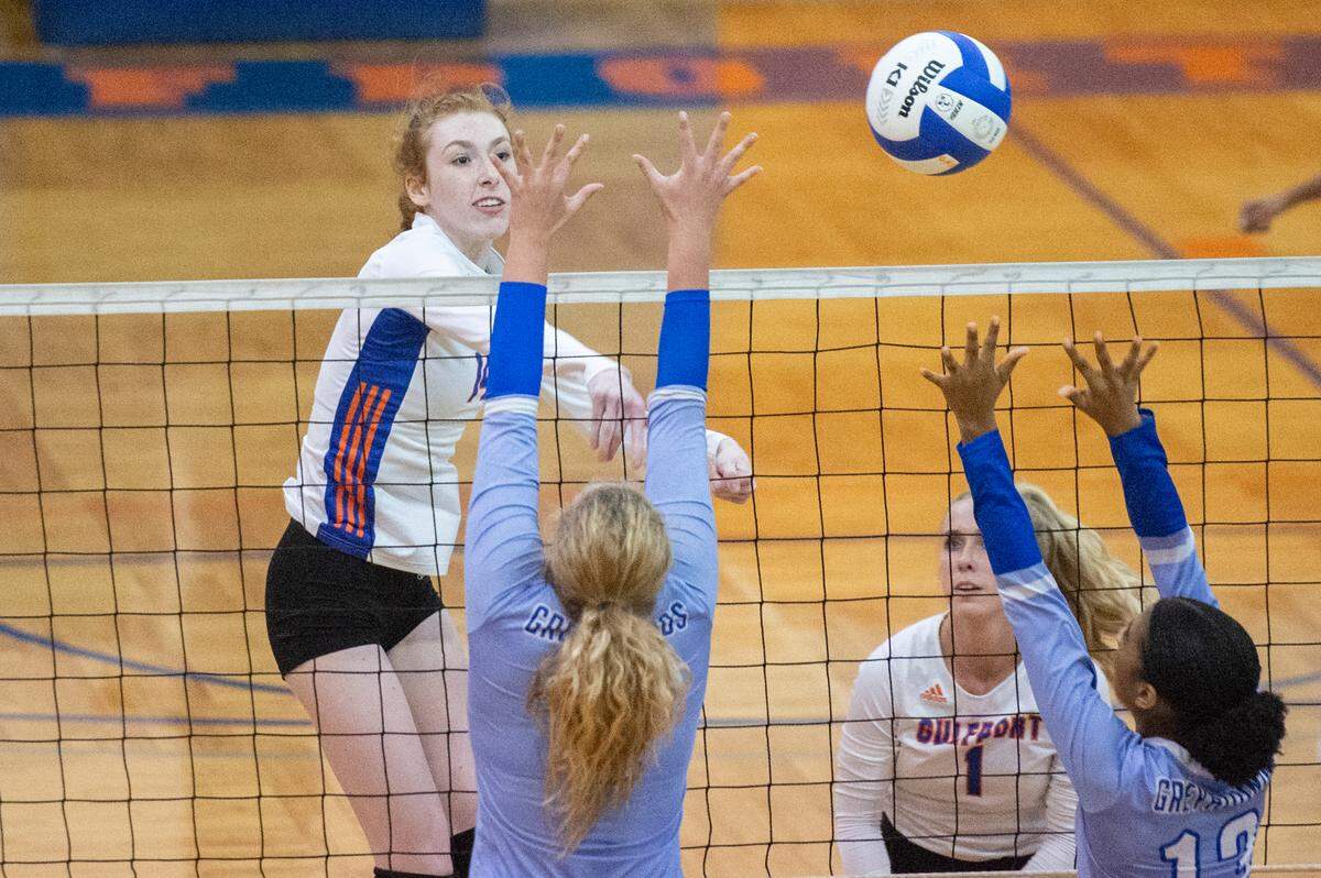 Gulfport’s Allie Hamric spikes the ball during a volleyball match against Ocean Springs at Gulfport High School in Gulfport on Tuesday, Oct. 4, 2022.