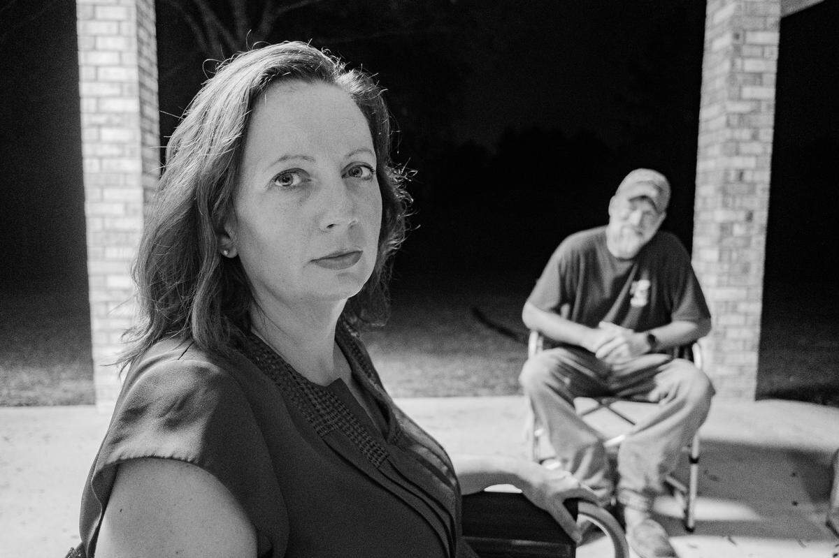 Amy Fletcher and Brett at their home.