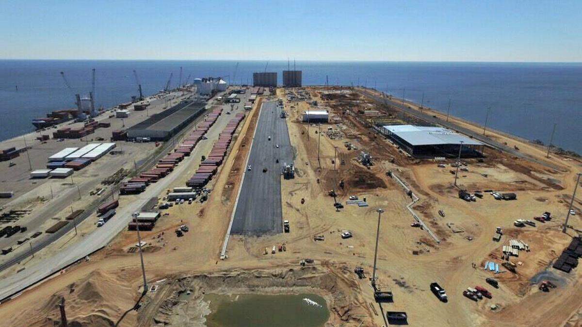 WARREN PAVING 
 An aerial shot of the West Pier from March 8, 2016, shows ongoing work on the pier's west side. The port has awarded a contract for construction on the pier's east side to Necaise Bros. Construction Co., but low bidder W.C. Fore is protesting the award.
