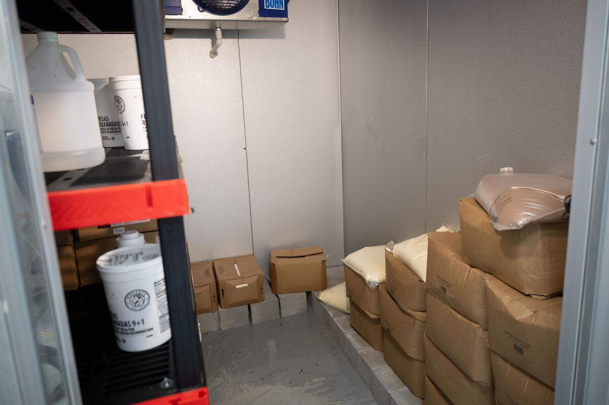 A freezer room is being filled with boxes of custard at the Quakes distribution center in Vancleave.