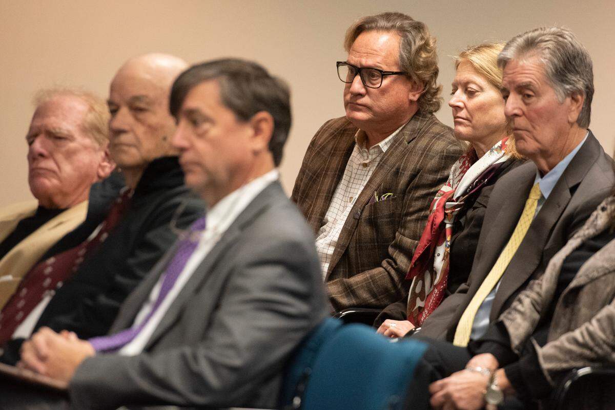 Danny Conwill listens as attorney Michael Cavanaugh makes a presentation to the Mississippi Gaming Commission on behalf of Biloxi Capital during a gaming commission meeting in Biloxi on Thursday, Jan. 16, 2025.