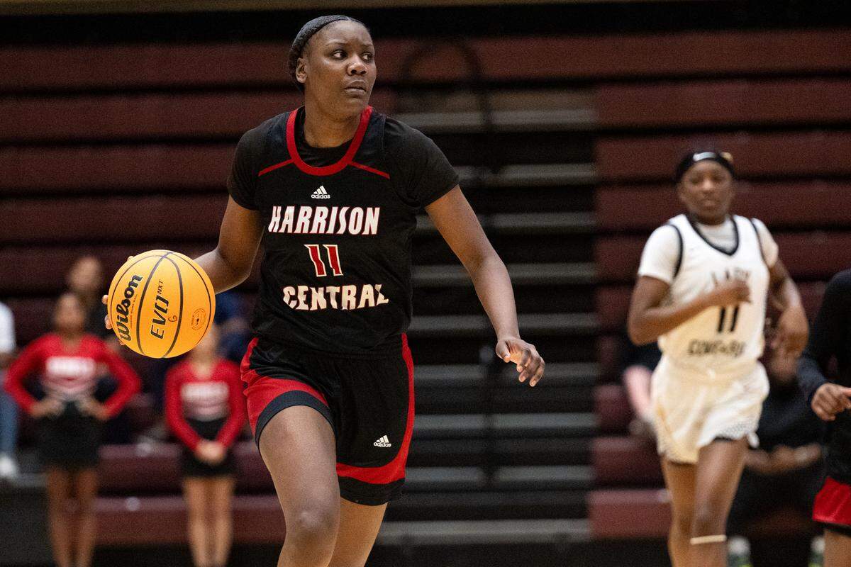 Harrison Central’s Saniyah Murray (11) dribbles the ball during a girls basketball game at Pearl River Community College on Friday, Feb. 27, 2026. The Red Rebelettes’ star scored 20 points in a Class 7A state semifinal win Tuesday.